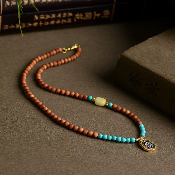 Zakiram Clavicle Chain Necklace Paired with Natural Beeswax Magnesite