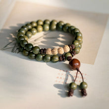Load image into Gallery viewer, Old material green sandalwood Buddha beads bracelet female forest student sandalwood passion seed bracelet couple ethnic style