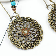 Load image into Gallery viewer, Bohemian Retro Long Hollow Flower Earrings