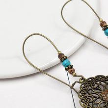 Load image into Gallery viewer, Bohemian Retro Long Hollow Flower Earrings