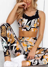 Load image into Gallery viewer, Two-piece yoga suit with printed cropped waistcoat and leggings